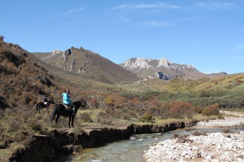 Tibet - rivier dede te paard