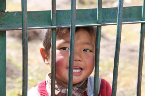 Tibet - tralie en kind
